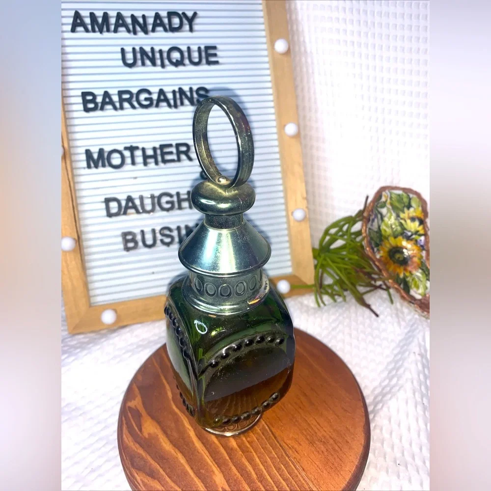 Unique vintage Avon collectible bottle designed in the shape of a lantern.